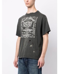 schwarzes T-Shirt mit einem Rundhalsausschnitt mit Destroyed-Effekten von SAINT MXXXXXX