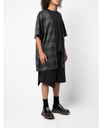 schwarzes T-Shirt mit einem Rundhalsausschnitt mit Flicken von Comme Des Garcons Homme Plus