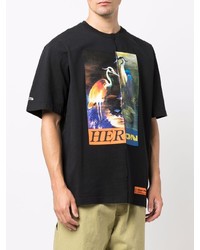 schwarzes T-Shirt mit einem Rundhalsausschnitt mit Flicken von Heron Preston