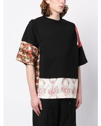 schwarzes T-Shirt mit einem Rundhalsausschnitt mit Flicken von Simone Rocha