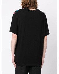 schwarzes T-Shirt mit einem Rundhalsausschnitt mit Flicken von Yohji Yamamoto