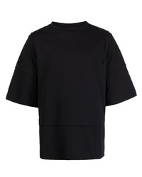 schwarzes T-Shirt mit einem Rundhalsausschnitt mit Flicken von Simone Rocha