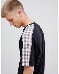 schwarzes T-Shirt mit einem Rundhalsausschnitt mit Karomuster von ASOS DESIGN