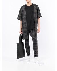 schwarzes T-Shirt mit einem Rundhalsausschnitt mit Schottenmuster von Comme Des Garcons Homme Plus