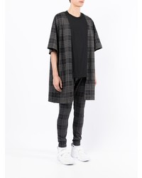 schwarzes T-Shirt mit einem Rundhalsausschnitt mit Schottenmuster von Comme Des Garcons Homme Plus