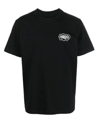 schwarzes T-Shirt mit einem Rundhalsausschnitt mit Sternenmuster von Sacai