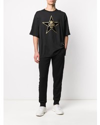 schwarzes T-Shirt mit einem Rundhalsausschnitt mit Sternenmuster von Dolce & Gabbana