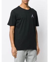 schwarzes T-Shirt mit einem Rundhalsausschnitt von Nike