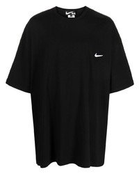 schwarzes T-Shirt mit einem Rundhalsausschnitt von Black Comme Des Garçons
