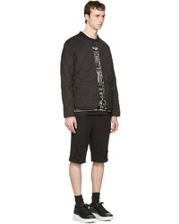 schwarzes T-Shirt mit einem Rundhalsausschnitt von Marcelo Burlon County of Milan