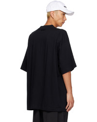 schwarzes T-Shirt mit einem Rundhalsausschnitt von Vetements