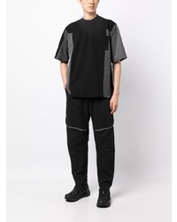 schwarzes T-Shirt mit einem Rundhalsausschnitt von White Mountaineering