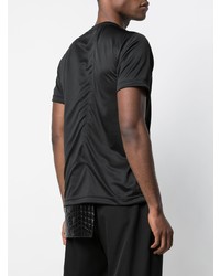 schwarzes T-Shirt mit einem Rundhalsausschnitt von Comme Des Garcons Homme Plus