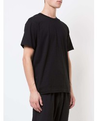 schwarzes T-Shirt mit einem Rundhalsausschnitt von Comme Des Garcons Homme Plus