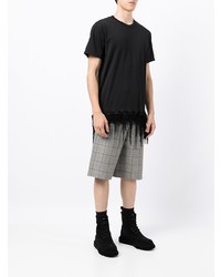 schwarzes T-Shirt mit einem Rundhalsausschnitt von Comme Des Garcons Homme Plus