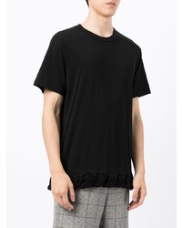 schwarzes T-Shirt mit einem Rundhalsausschnitt von Comme Des Garcons Homme Plus