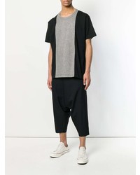 schwarzes T-Shirt mit einem Rundhalsausschnitt von Comme Des Garcons Homme Plus