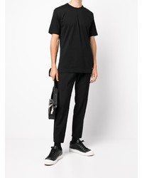 schwarzes T-Shirt mit einem Rundhalsausschnitt von Comme Des Garcons SHIRT