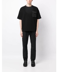 schwarzes T-Shirt mit einem Rundhalsausschnitt von White Mountaineering