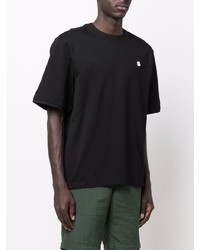 schwarzes T-Shirt mit einem Rundhalsausschnitt von Sacai