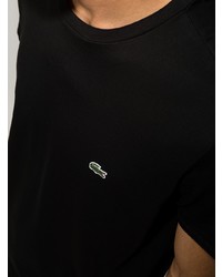 schwarzes T-Shirt mit einem Rundhalsausschnitt von Lacoste