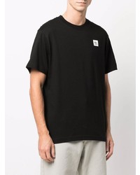 schwarzes T-Shirt mit einem Rundhalsausschnitt von Lacoste