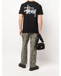 schwarzes T-Shirt mit einem Rundhalsausschnitt von Stussy