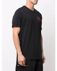 schwarzes T-Shirt mit einem Rundhalsausschnitt von Nike