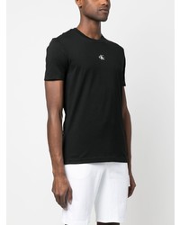 schwarzes T-Shirt mit einem Rundhalsausschnitt von Calvin Klein