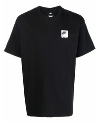 schwarzes T-Shirt mit einem Rundhalsausschnitt von Nike