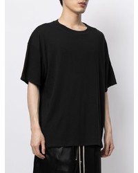 schwarzes T-Shirt mit einem Rundhalsausschnitt von FEAR OF GOD ESSENTIALS