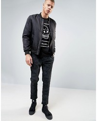 schwarzes T-shirt von Cheap Monday