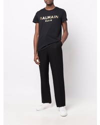 schwarzes und goldenes bedrucktes T-Shirt mit einem Rundhalsausschnitt von Balmain