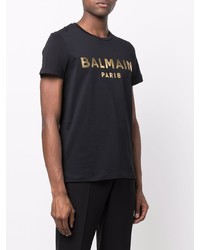 schwarzes und goldenes bedrucktes T-Shirt mit einem Rundhalsausschnitt von Balmain