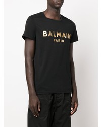 schwarzes und goldenes bedrucktes T-Shirt mit einem Rundhalsausschnitt von Balmain