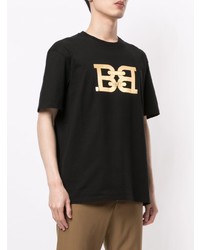 schwarzes und goldenes bedrucktes T-Shirt mit einem Rundhalsausschnitt von Bally