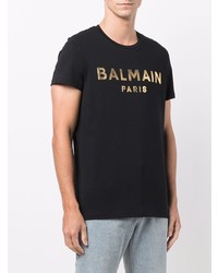 schwarzes und goldenes bedrucktes T-Shirt mit einem Rundhalsausschnitt von Balmain