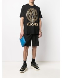 schwarzes und goldenes bedrucktes T-Shirt mit einem Rundhalsausschnitt von Versace