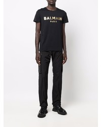 schwarzes und goldenes bedrucktes T-Shirt mit einem Rundhalsausschnitt von Balmain