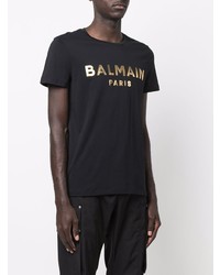 schwarzes und goldenes bedrucktes T-Shirt mit einem Rundhalsausschnitt von Balmain