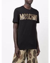 schwarzes und goldenes bedrucktes T-Shirt mit einem Rundhalsausschnitt von Moschino