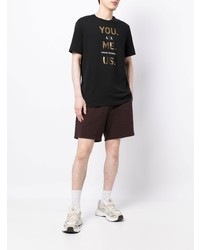 schwarzes und goldenes bedrucktes T-Shirt mit einem Rundhalsausschnitt von Armani Exchange