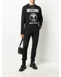 schwarzes und weißes bedrucktes Langarmshirt von Moschino