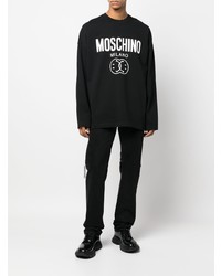 schwarzes und weißes bedrucktes Langarmshirt von Moschino