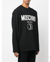 schwarzes und weißes bedrucktes Langarmshirt von Moschino