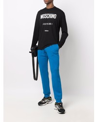 schwarzes und weißes bedrucktes Langarmshirt von Moschino