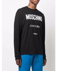 schwarzes und weißes bedrucktes Langarmshirt von Moschino