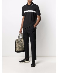 schwarzes und weißes bedrucktes Polohemd von Calvin Klein