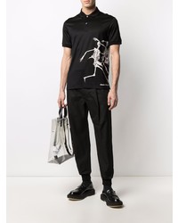 schwarzes und weißes bedrucktes Polohemd von Alexander McQueen
