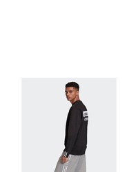 schwarzes und weißes bedrucktes Sweatshirt von adidas Originals